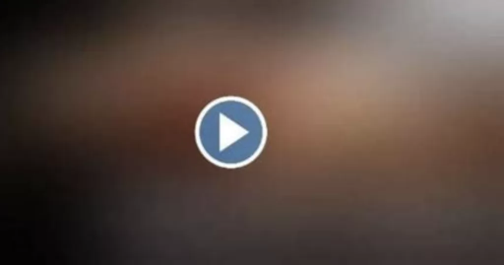 blurred video example with play button